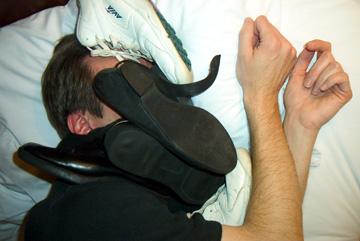 Mistress Sharina Nicole's foot slave mike sleeps with a pile of his Mistress' shoes!
